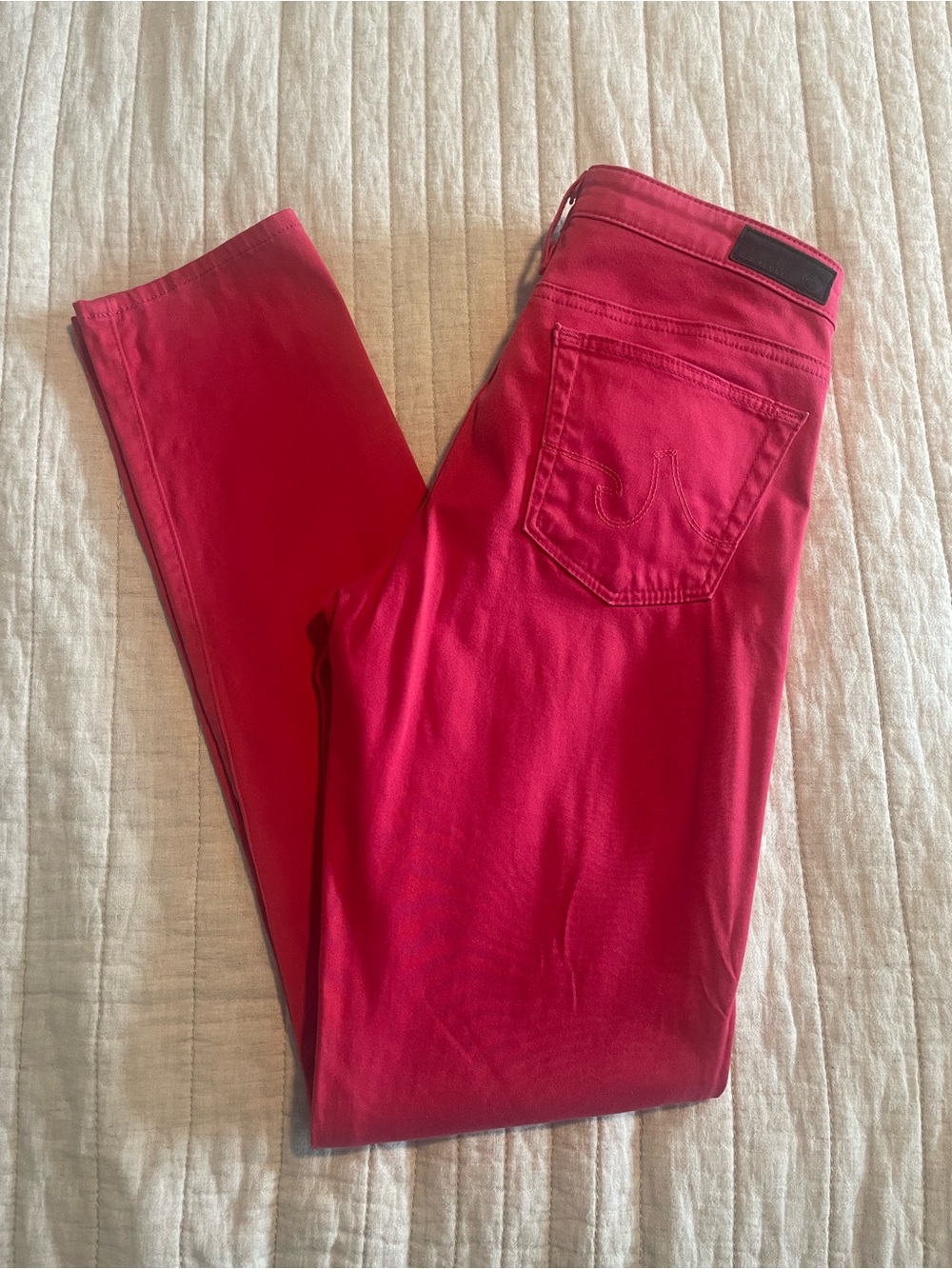 AG the stilt pink skinny jeans